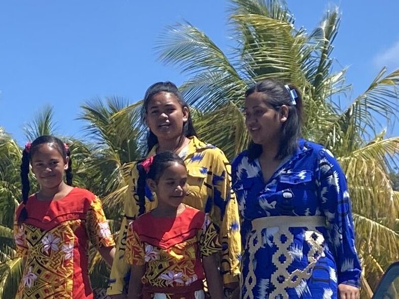 While exploring Niuatoputapu we came across four Tongan children dressed traditionally for church